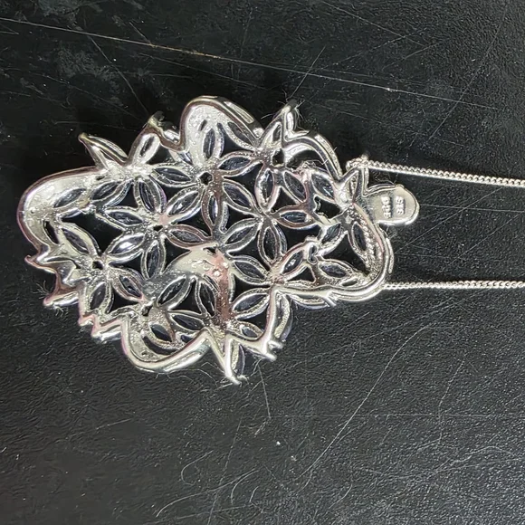 Elegant Silver and Tanzanite Jewelry Set - Picture 8 of 11